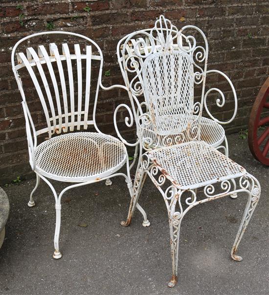 Pair of white painted wrought iron elbow chairs & a single chair